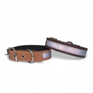 Collar en cuero de vacuno con cinta reflectante de calidad. Fabricado en todas las tallas, con opción de elegir distintos acabados de fornituras (oro, plata, negro, etc.). Se puede añadir logo grabado a fuego.